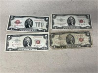 (4) red seal two dollar bills
