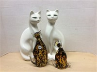 2 Amber/black glass cats & 2 white cats