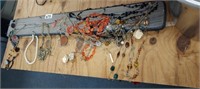 NECKLACE BOARD FULL OF NECKLACES