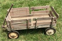 Antique child wooden wagon with wooden side