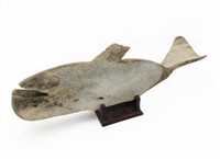 Fossilized Whale Bone Carving of a Whale.