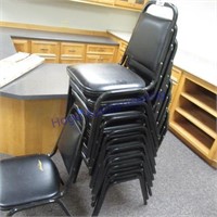 11 Stackable black color chairs