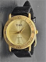 Vtg. Gold Tone Time Watch on Black Leather Band