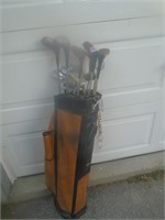 Golf Bag full of used Golf Clubs and Balls