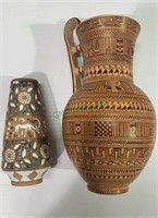 2 Greek pottery vases - one with a green and white