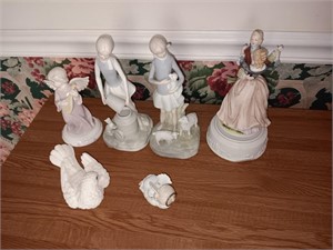 6 porcelain figures.