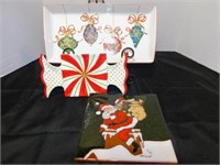 2 Christmas serving trays and 1 tera cotta trivet