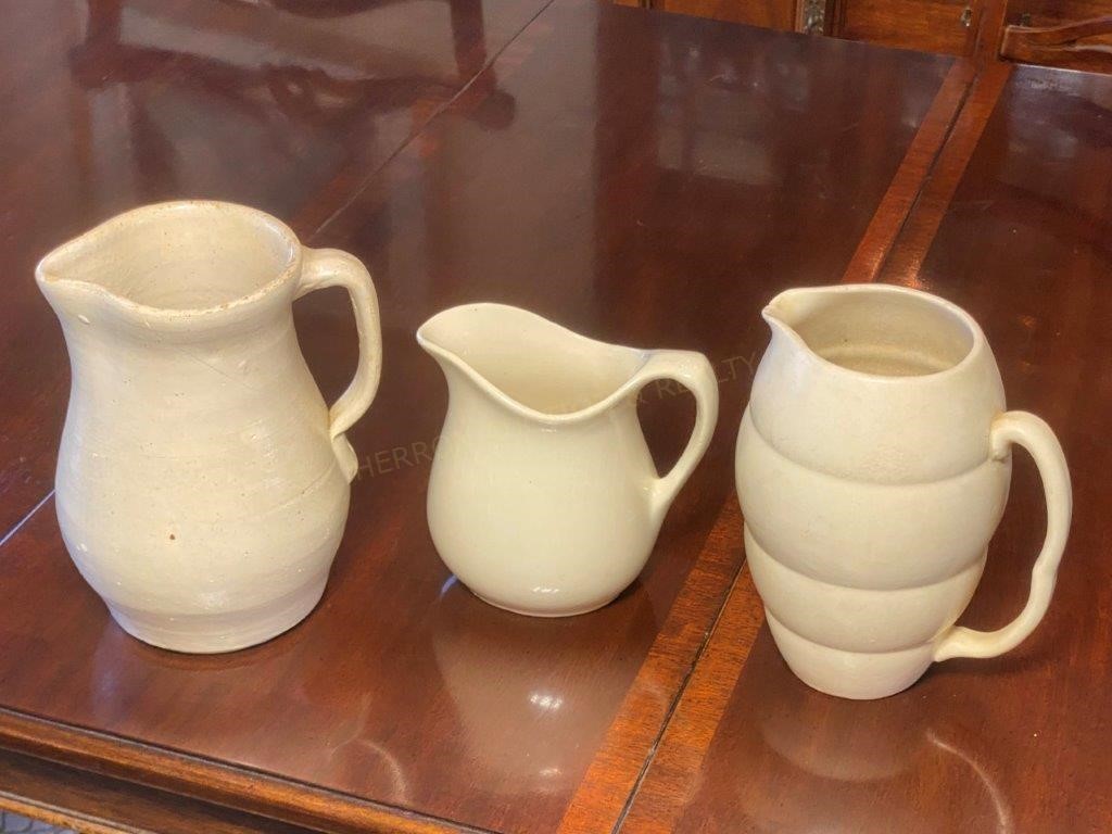 3 Pottery Pitchers