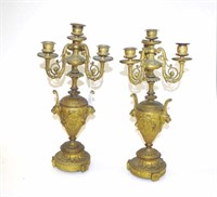 Pair of ornate gilt metal candelabras