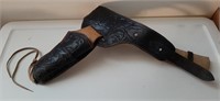 Tooled leather holster with tooled leather belt
