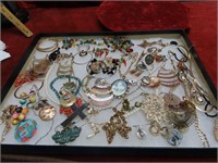 Assorted jewelry in showcase.