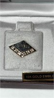 1.65g 10K Gold Emblem Qwest