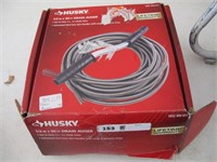 HUSKY 1/2 BY 58 FEET DRAIN AUGER. IN BOX
