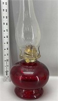 Antique red glass oil lamp
