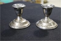 Sterling weighted low candle sticks marked Empire
