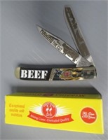 Kissing Crane Beef folding knife in box.