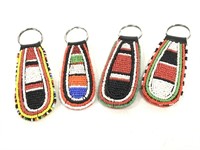 Four tribal style beaded keychains
