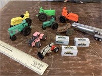 Lot of plastic tractors and other miscellaneous