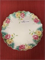 Porcelain charger with hand painted rose motif