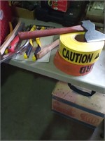 Caution tape, hatchet, steel brushes