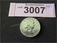 Uncirculated `1957 Franklin silver half dollar