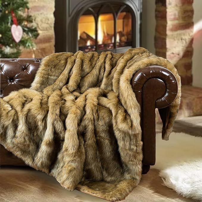 $150 Ochre Faux Fur Throw Blanket