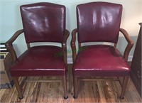 2 burgundy leather-like office armchairs -