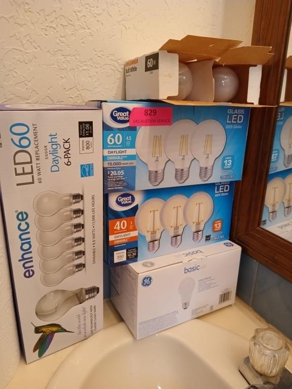 Assorted light bulbs, some boxes are not full