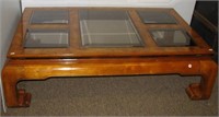 Wood coffee table with five tinted beveled glass