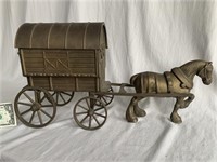 A heavy brass horse and caravan 21 inch long