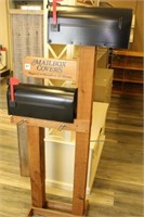 double mailbox stand with mailboxes and hangers