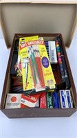 Box of art supplies- chalk, paintbrushes, markers