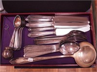 Set of silverplate flatware: 6 knives, 6 forks,