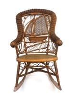 A fine Victorian wicker theme backed rocker.