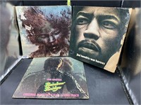 3 Jimi Hendrix vinyl records - case are pretty