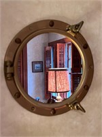 Small porthole wall mirror