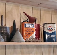 Vintage funnels and oil cans
