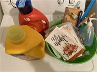 Bowl with miscellaneous items, laundry detergent