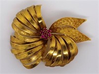 Gold and ruby flower brooch