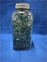 Atlas Jar Filled With Marbles