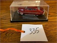 METAL CAR IN GLASS CASE