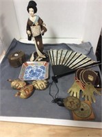 Asian themed doll, fan, brass pieces, dish, 3