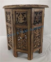 Carved accent table