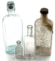 (4) Antique Advertising Bottles