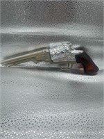 empty avon after shave revolver