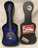 Novelty miniature Fender electric guitar.