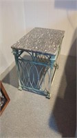 CAST IRON END TABLE WITH A GRANITE TOP