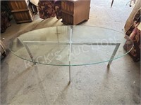 oval glass top coffee table w/ heavy chrome base