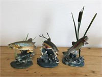 Three trout sculptures