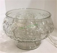 Punch bowl with approximately 12 matching cups.